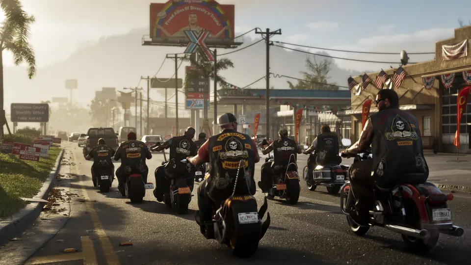 A motorcycle club rides in formation down a road in Ambrosia.