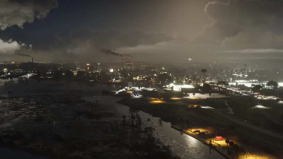 Ambrosia at night, with smoke stacks in the distance.