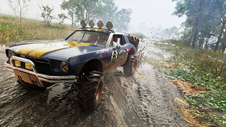 A lifted Vapid buggy kicks up mud.