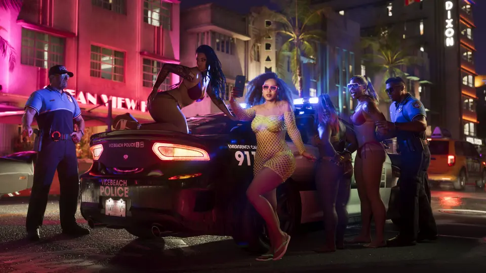 Police handcuff two women beside a patrol car in Vice City while a third takes a selfie.
